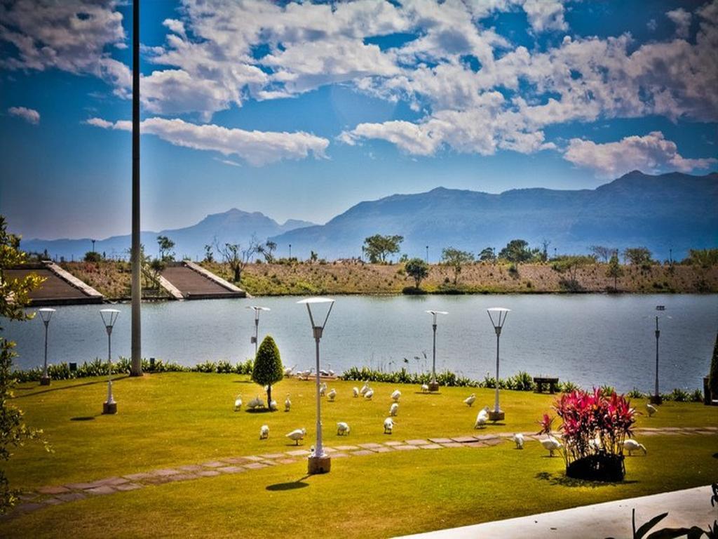 Aamby Valley City Lonavala Ngoại thất bức ảnh View of the lake from the hotel