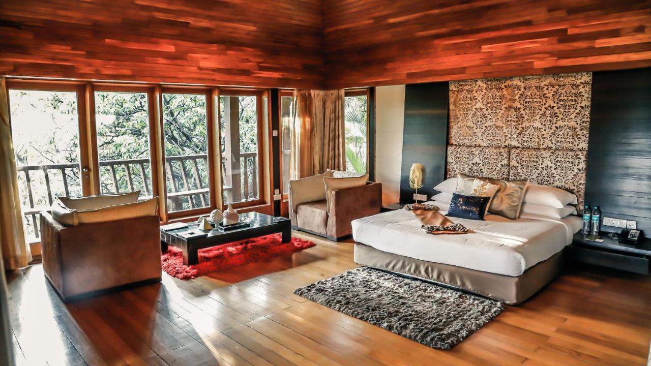 Aamby Valley City Lonavala Ngoại thất bức ảnh A bedroom at the Taj Bengal
