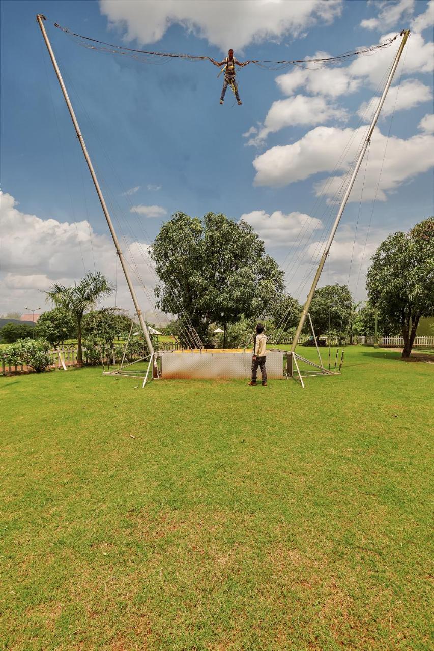 Aamby Valley City Lonavala Ngoại thất bức ảnh The trampoline at the park